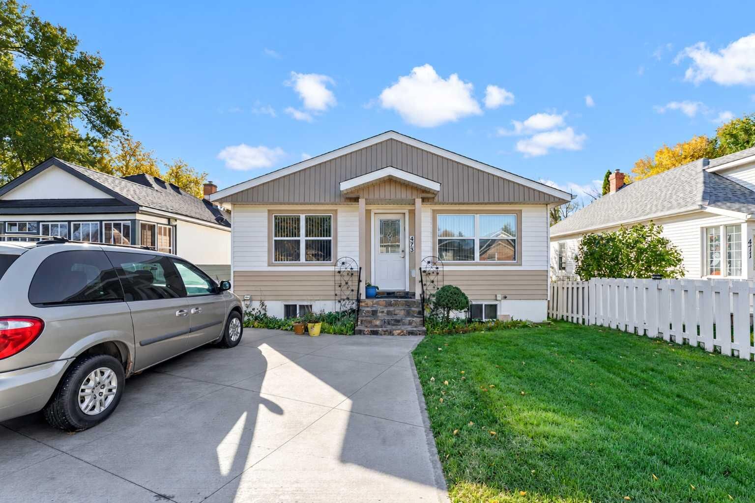 Property Photo:  473 10 Street SE  AB T1A 1R2 