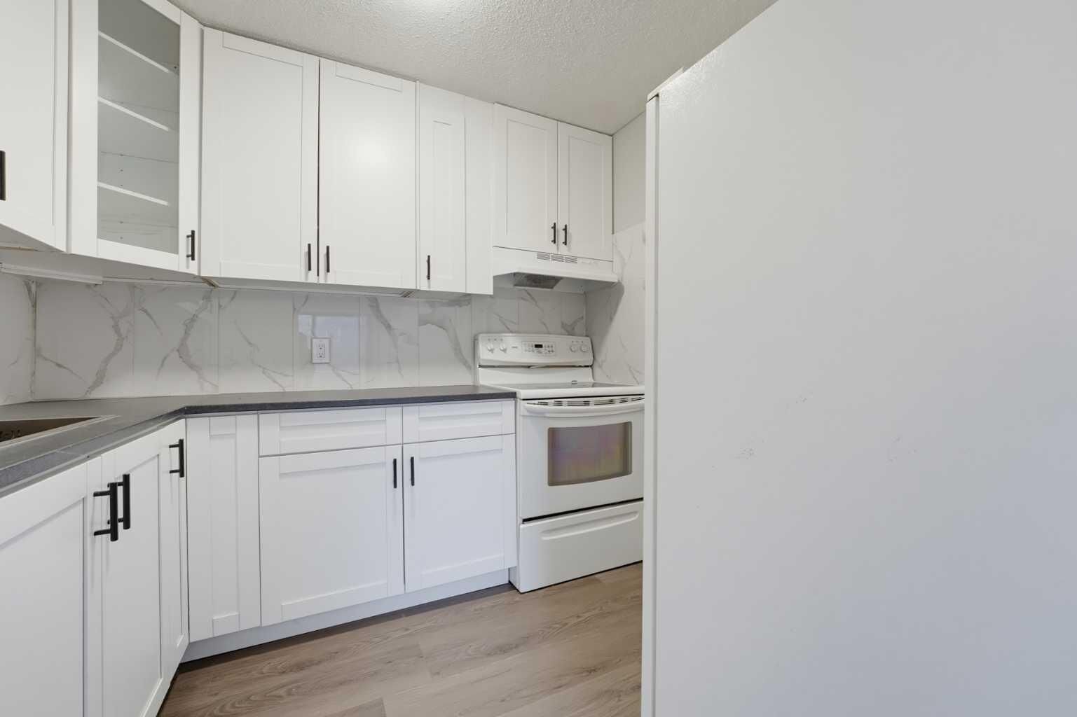 Property Photo:  2519 38 Street NE 98  AB T1Y 4W8 