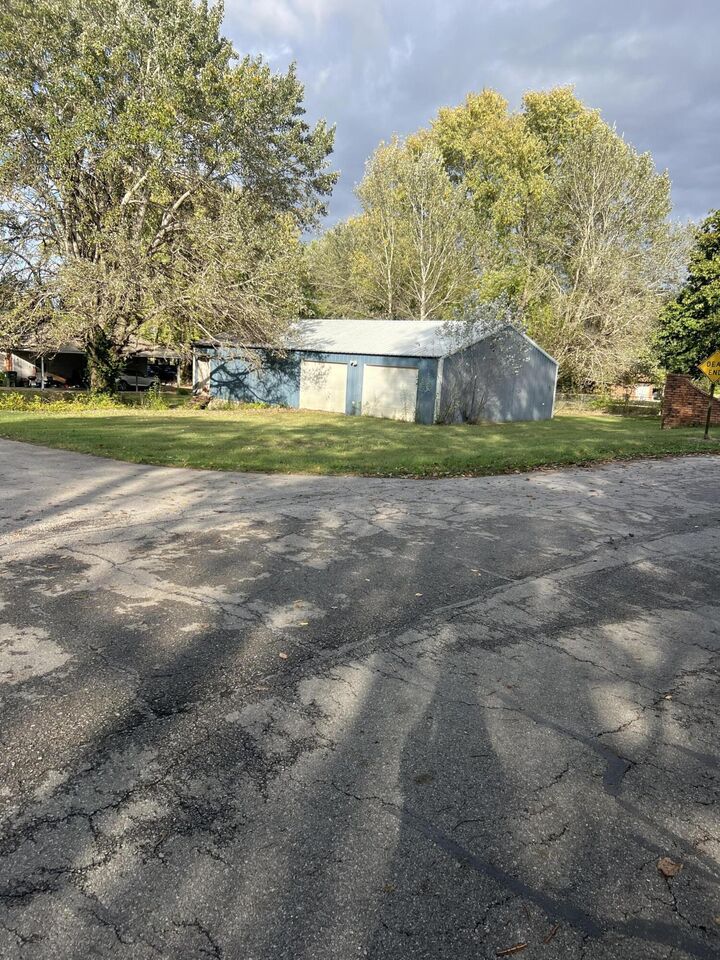 Property Photo:  1406 S McPhail Drive  MO 65605 