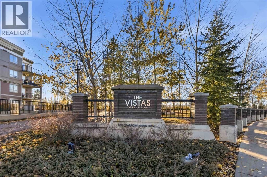 Property Photo:  204 Sparrow Hawk Drive  AB T9K 0P1 