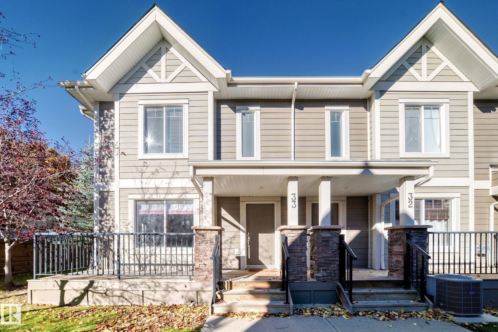 Property Photo: 1150 Windermere Way SW 33 AB T6W 2B6