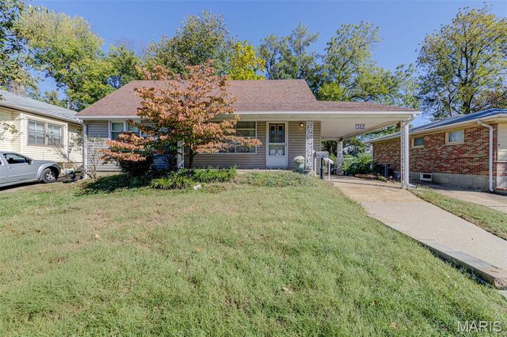 Property Photo:  312 Saint Louis Avenue  MO 63135 