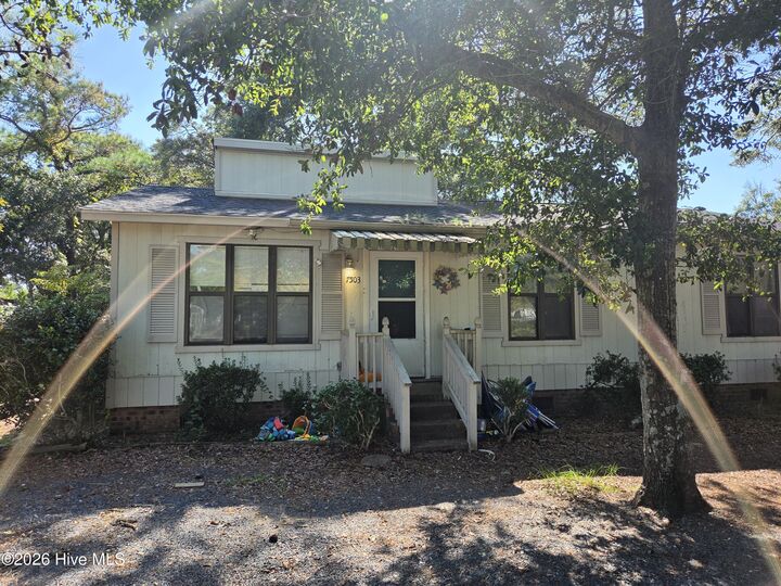 Property Photo:  7503 E Oak Island Drive  NC 28465 