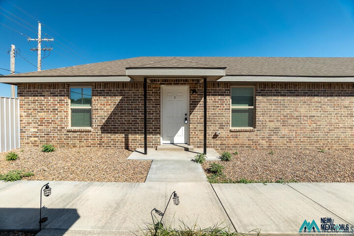 Property Photo:  2512 E 14th 2514  NM 88101 
