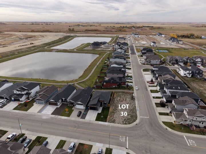 Property Photo:  103 Lakewood Circle  AB T1P 0G8 