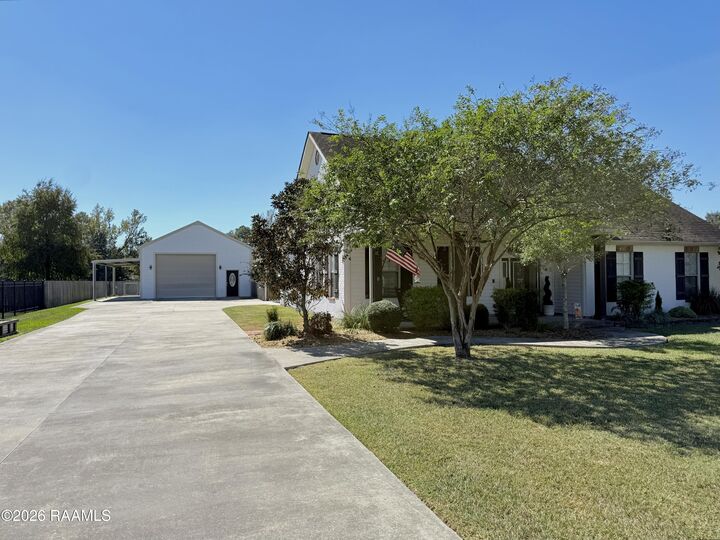Property Photo:  1015 Oleste Tauzin Road  LA 70517 