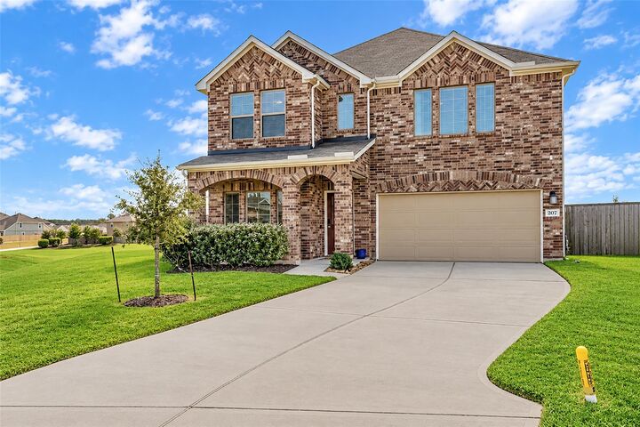 Property Photo:  207 Alder Laurels Cove  TX 77354 