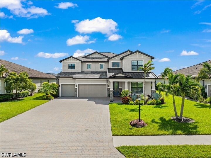 Property Photo:  19390 The Place Boulevard  FL 33928 