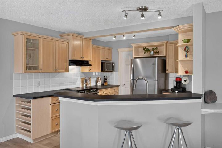 Property Photo:  20 Chapman Court SE  AB T2X 3S6 