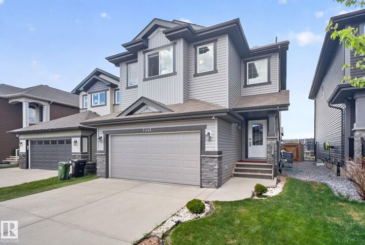Property Photo:  7341 Armour Crescent SW  AB T6W 2S2 