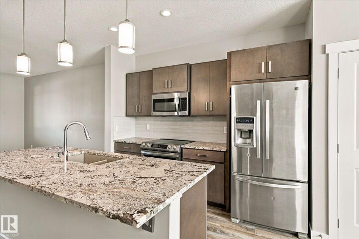 Property Photo: 4125 Martin Avenue NW AB T5E 6S3