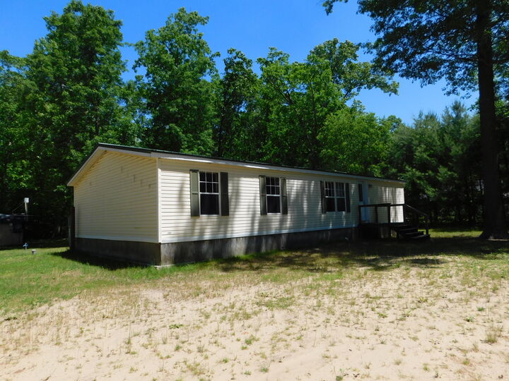 Property Photo: 647 N Hart Road MI 49689