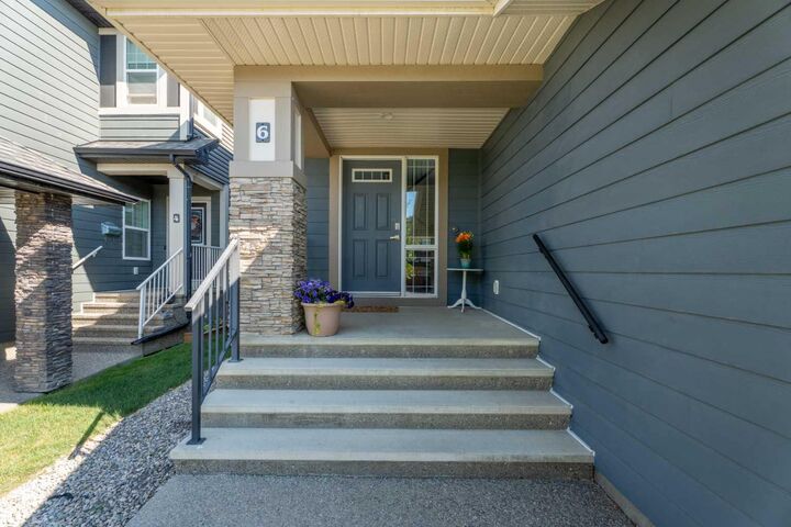 Property Photo:  6 Storm Mountain Place  AB T1S 0L6 