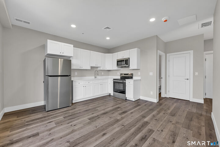 Property Photo: 1 West Main Street 4I CT 06451