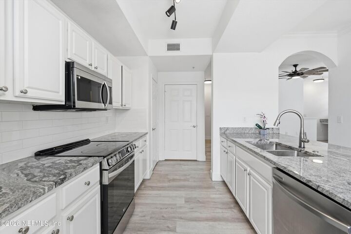 Property Photo:  10075-A Gate Parkway N 701  FL 32246 