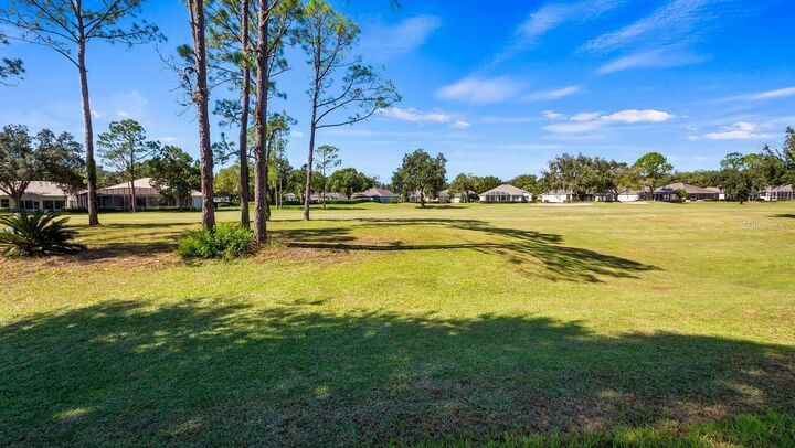 Property Photo: 3720 Doune Way FL 34711