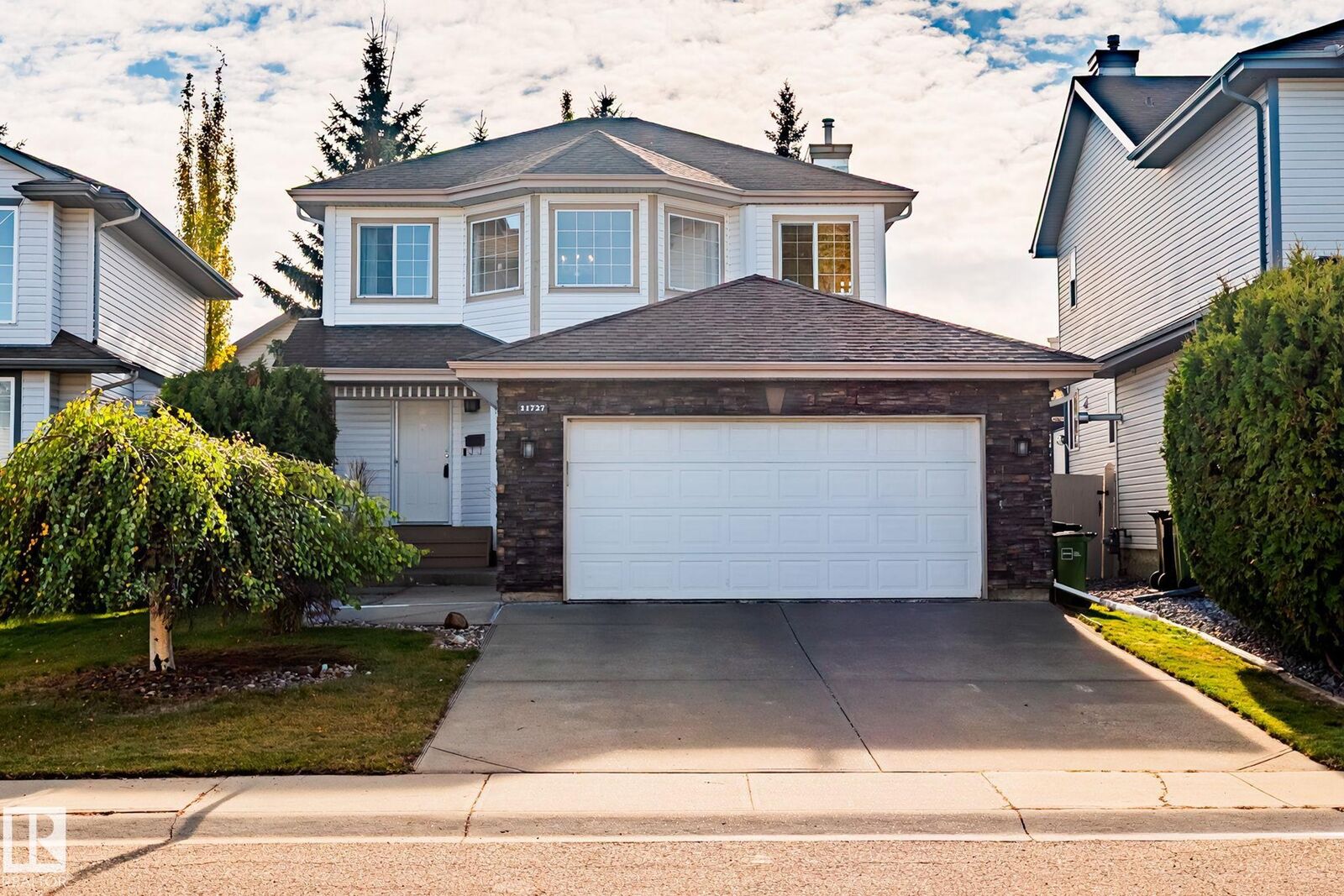 Property Photo:  11727 13 Avenue NW  AB T6J 7G1 
