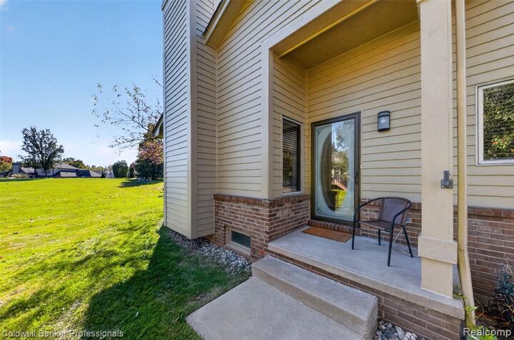 Property Photo: 8421 Solca Drive 33 MI 48386