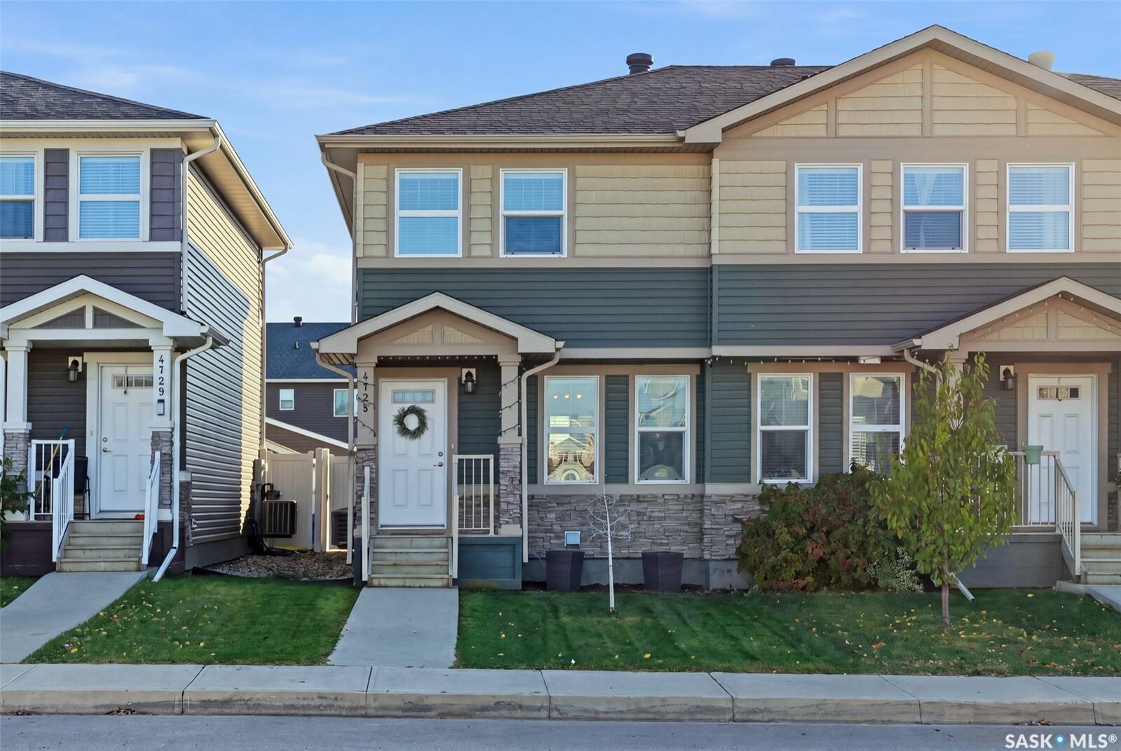 Property Photo:  4725 Primrose Green Drive E  SK S4V 3K9 
