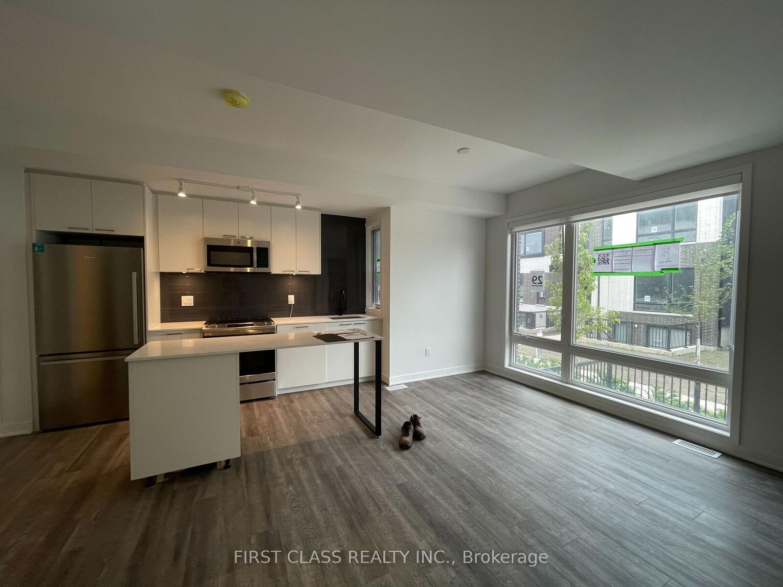 Property Photo:  20 Ed Clark Gardens Th13  ON M6N 1J5 