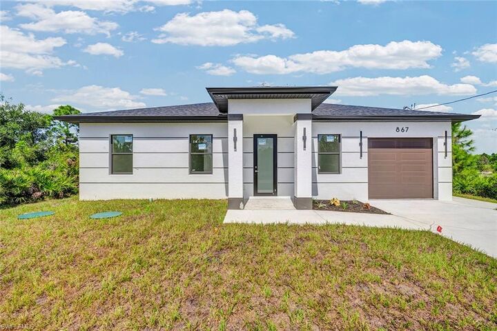 Property Photo: 867 Millpond St E FL 33974