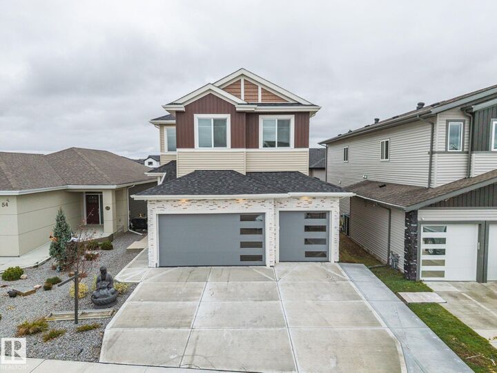 Property Photo: 58 Hummingbird Crescent AB T8L 0X7