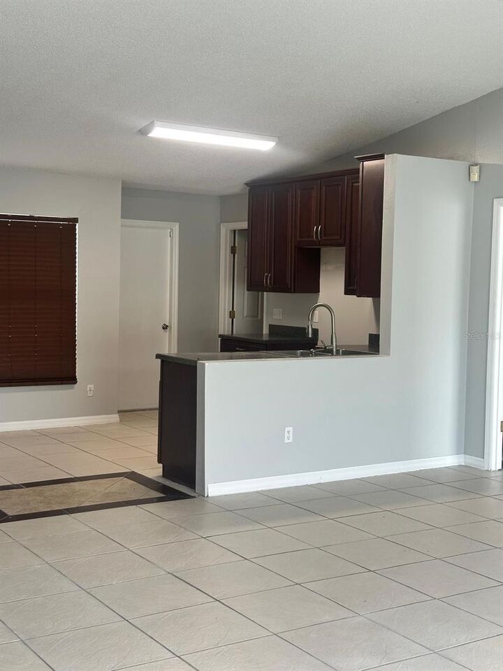 Property Photo:  608 Yak Court  FL 34759 