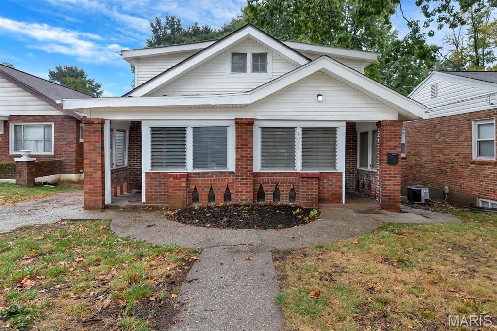 Property Photo:  9022 Midland Boulevard  MO 63114 