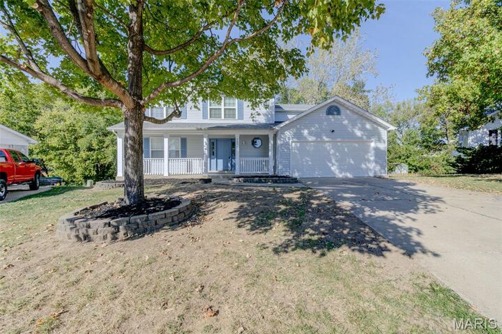 Property Photo:  2601 Red Cedar Parc Drive N  MO 63368 