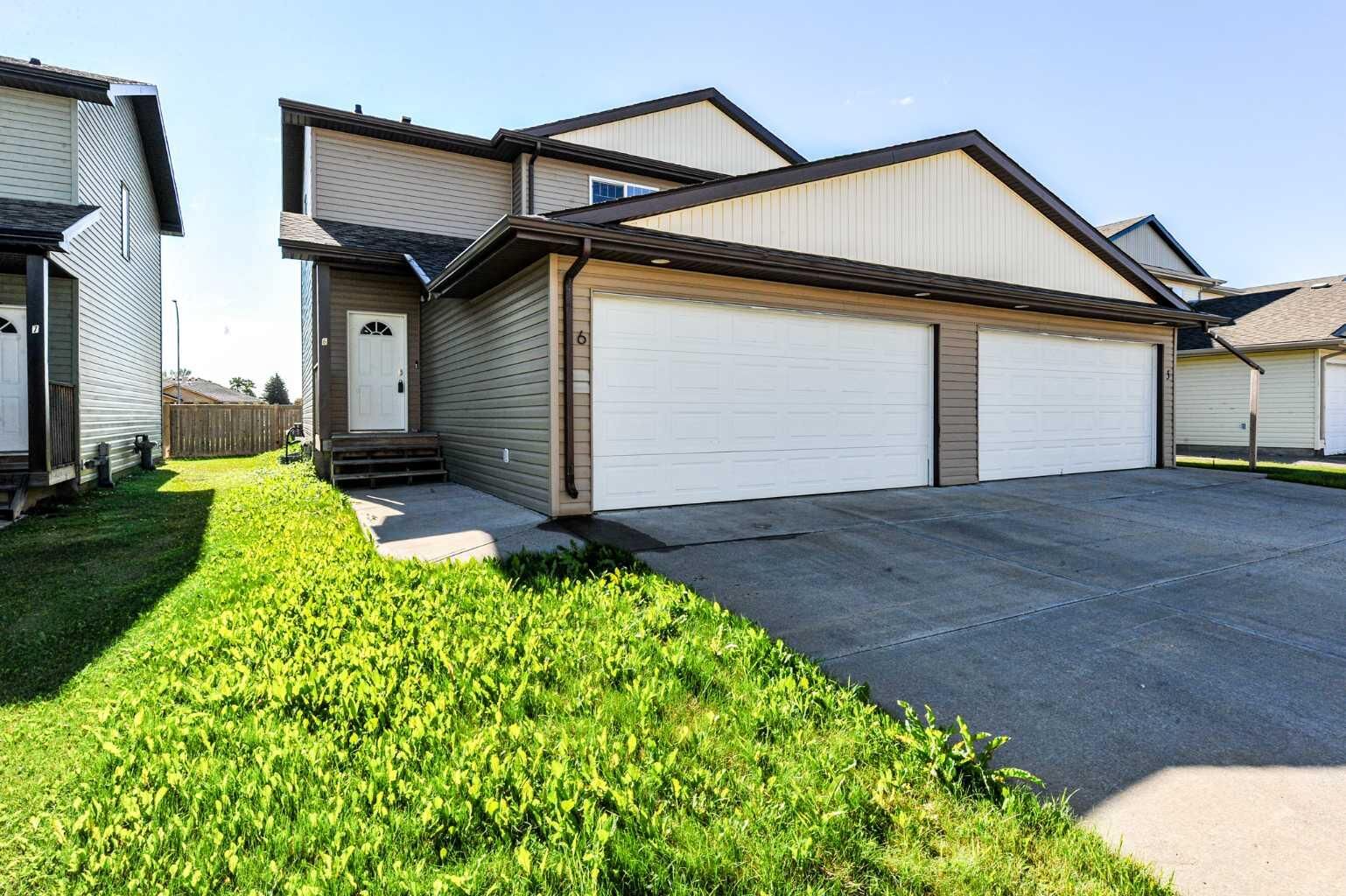 Property Photo:  6802 50 Avenue 6  AB T4V 5C7 