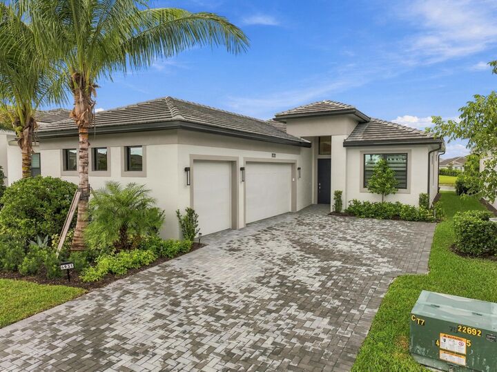 Property Photo: 4931 Rivo Alto Circle FL 33470