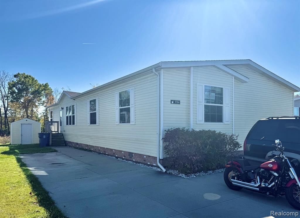 Property Photo:  9784 Birmingham Street  MI 48430 