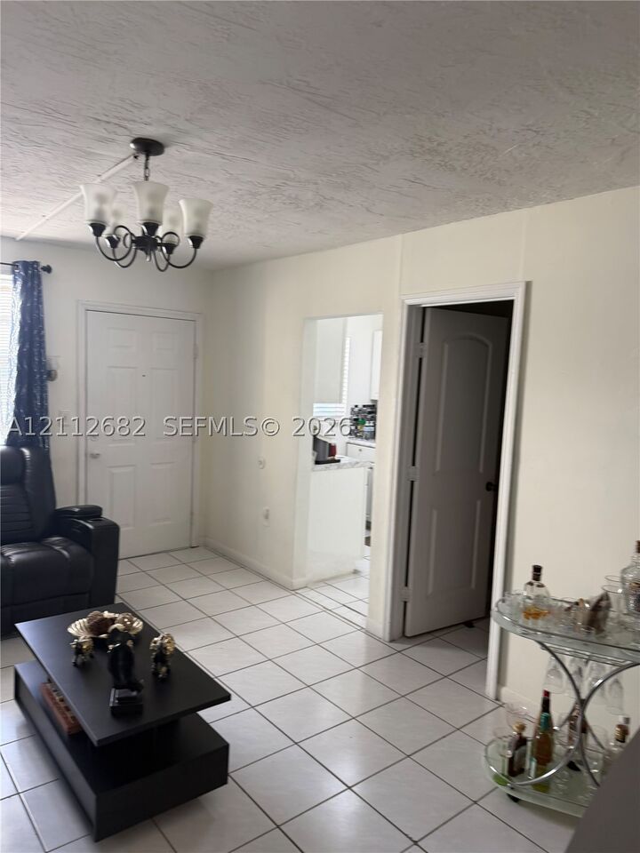 Property Photo:  1655 W 44th Pl 435  FL 33012 