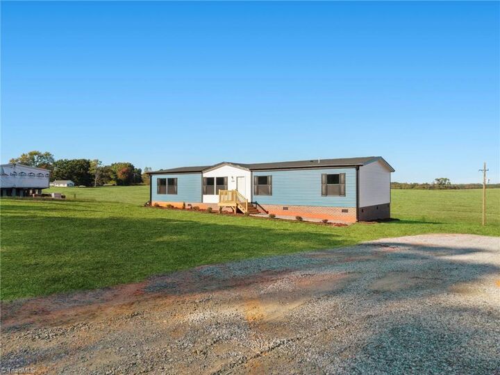 Property Photo:  5176 Forbush Road  NC 27018 
