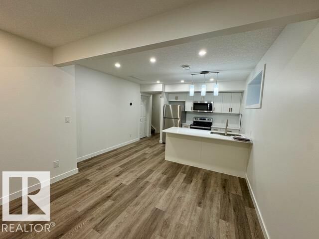 Property Photo:  22120 80 Avenue NW Bsmt  AB T5T 7R6 