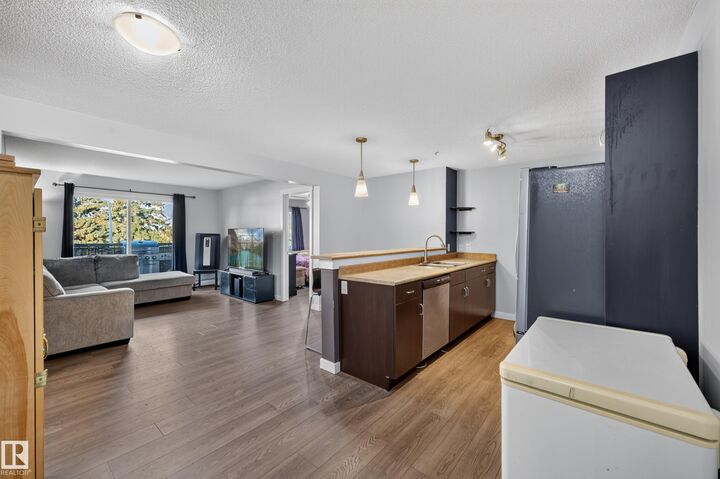 Property Photo:  1180 Hyndman Road NW 326  AB T5A 0P8 