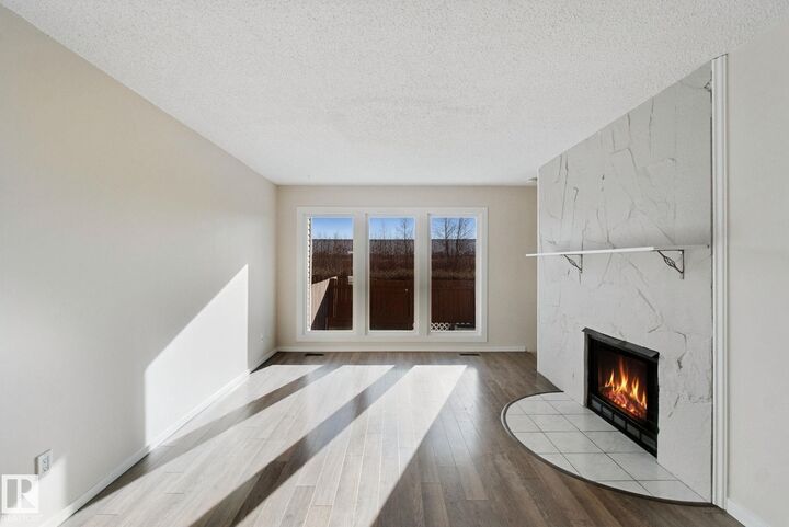 Property Photo:  4707 126 Avenue NW 11  AB T5A 4K4 