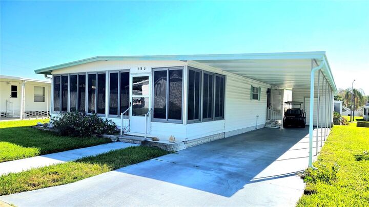 Property Photo: 39820 US Highway 19 N 182 FL 34689