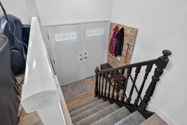 Property Photo: 1051 Abbeydale Drive NE AB T2A 6H4