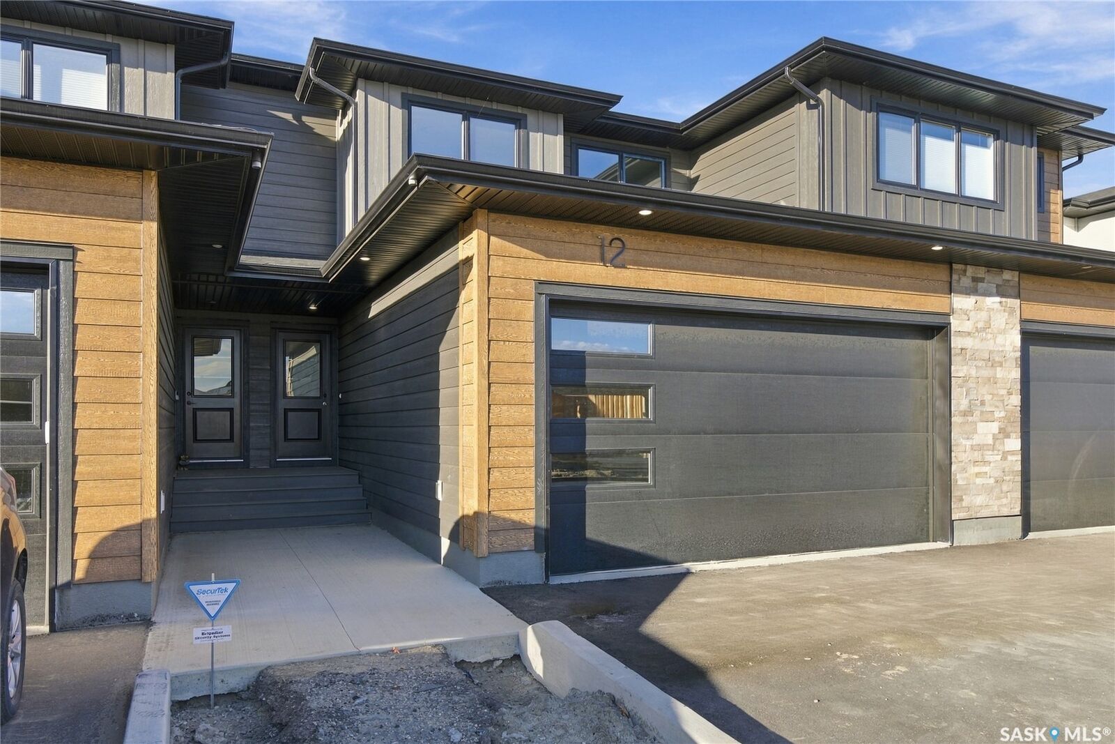 Property Photo:  830 Brighton Boulevard 12  SK S7V 2A8 