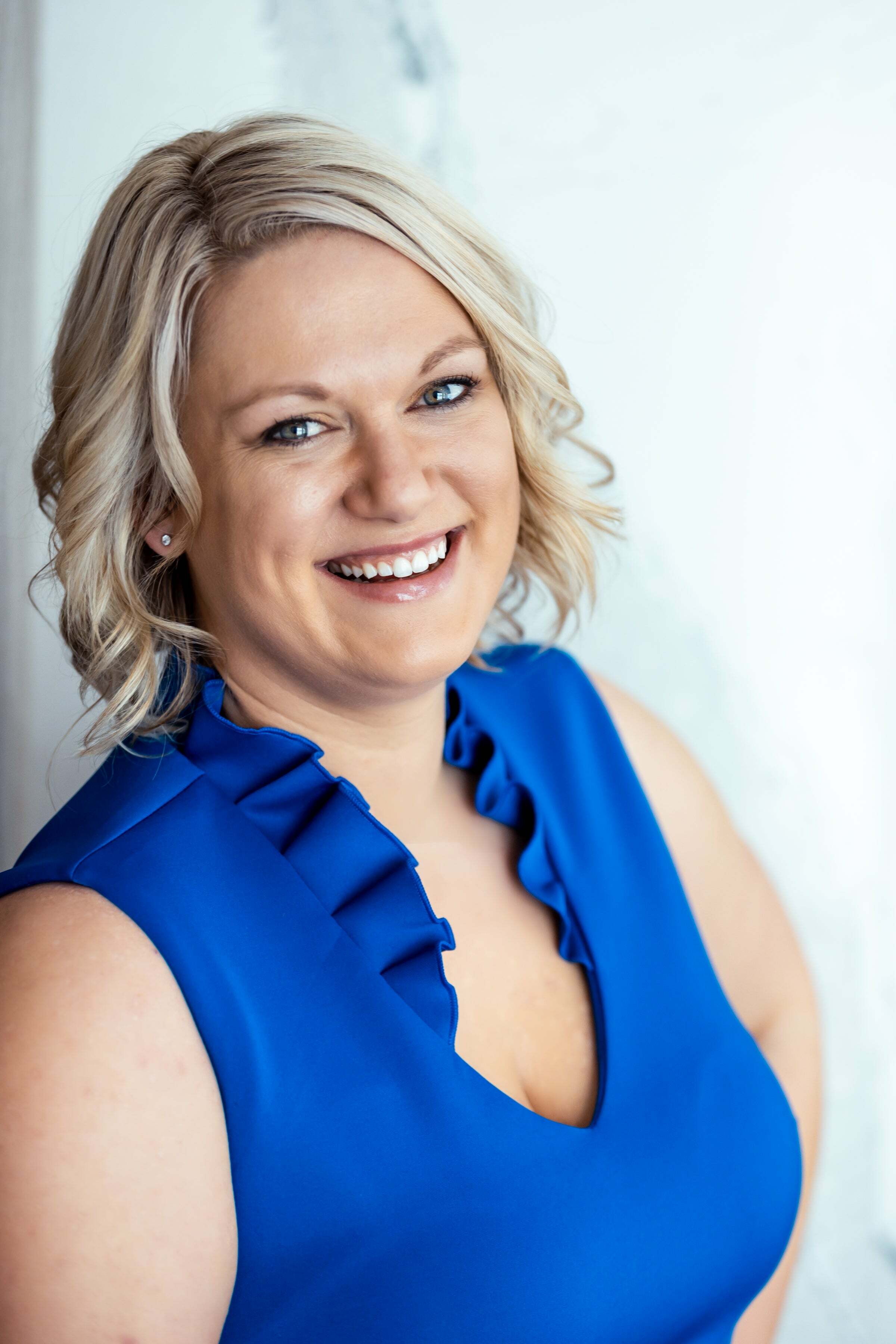 Amber Barr,  in Omaha, The Good Life Group