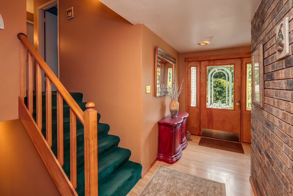 Property Photo: Come on in! this is the welcoming entry with the stairway to 3 of the 4 bedrooms. 795 Christian Wy  WA 98229 