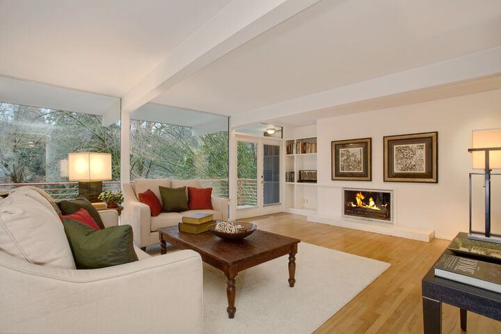 Property Photo: Large living room with expansive covered balcony 2524 Lake Park Dr S  WA 98144 