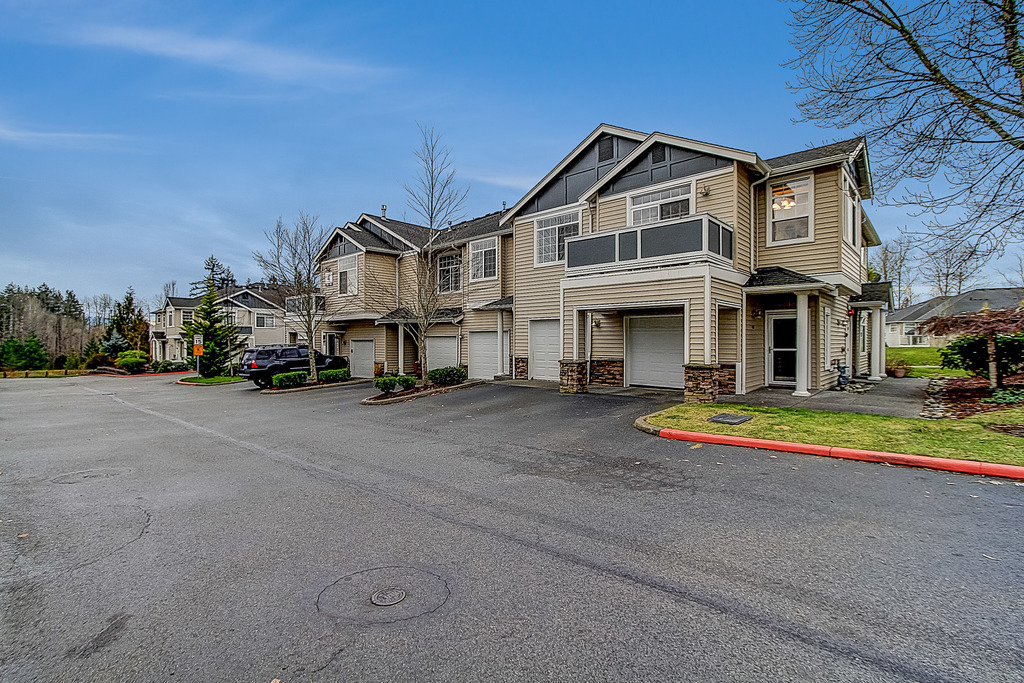 Property Photo:  1855 Trossachs Blvd SE 405  WA 98075 