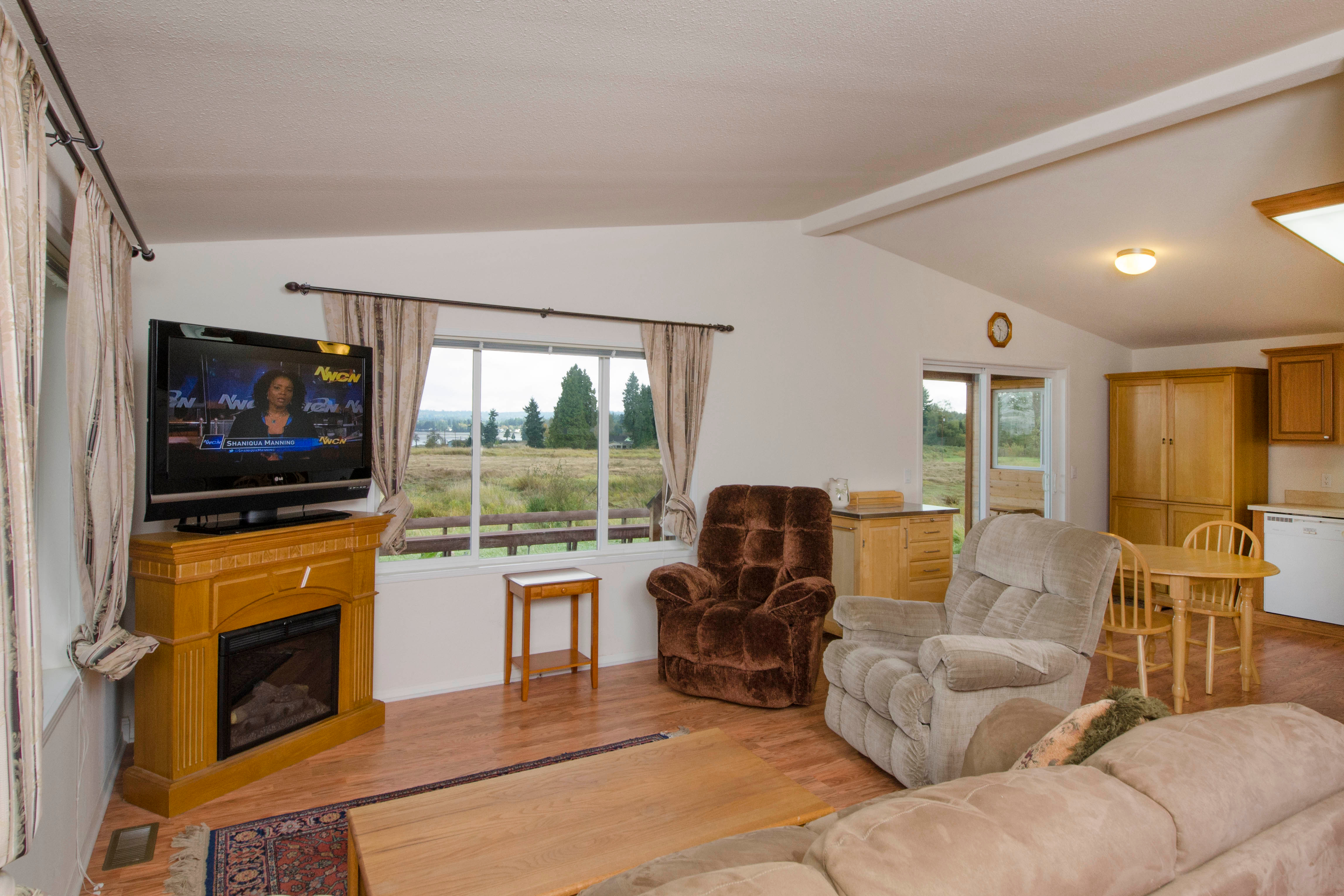 Property Photo: Living room 8585 Harborview Rd 5 WA 98230
