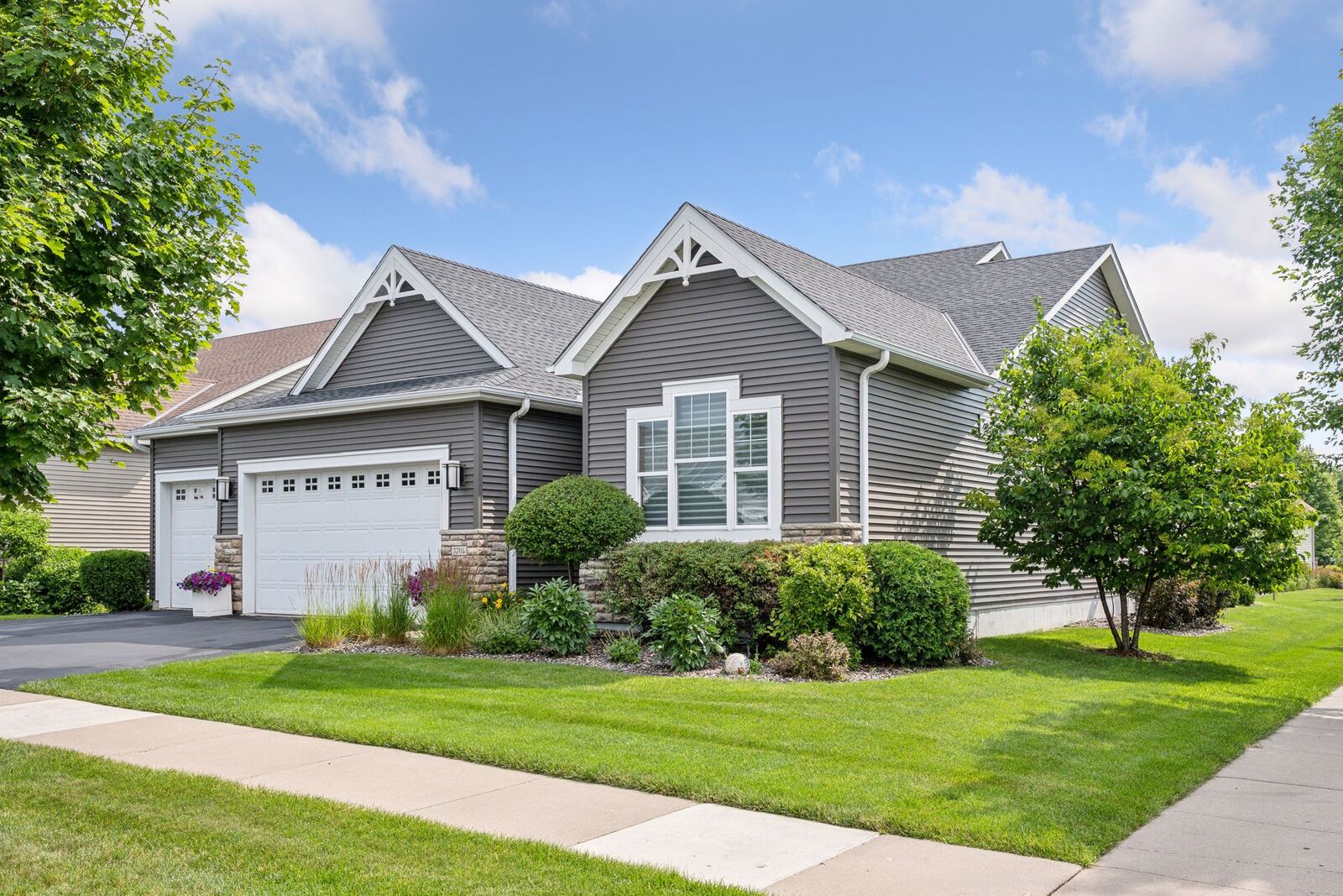 Property Photo:  7704 Queensland Lane N  MN 55311 