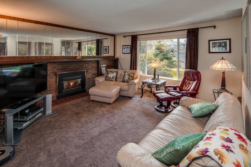 Property Photo: The family room is large and has a gas fireplace insert with built-ins on either side. 805 Bennett Ct  WA 98229 